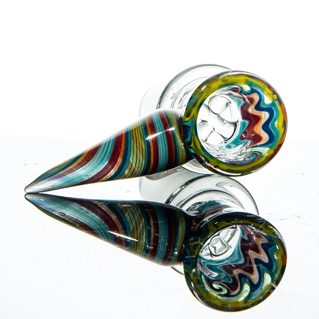 Colorful glass slide bowl with yellow, blue, and red wigwag patterns, 18mm size, clear base.