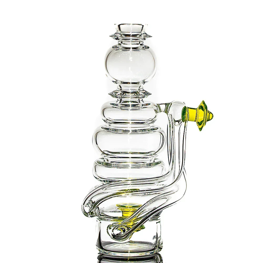 Clear artistic glass water pipe with yellow accents and intricate recycler design