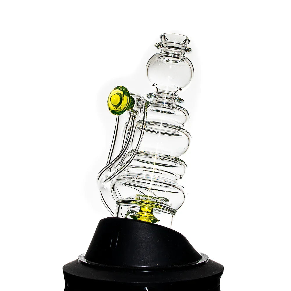 Clear heady glass water pipe with spiral design and yellow accents on a white background