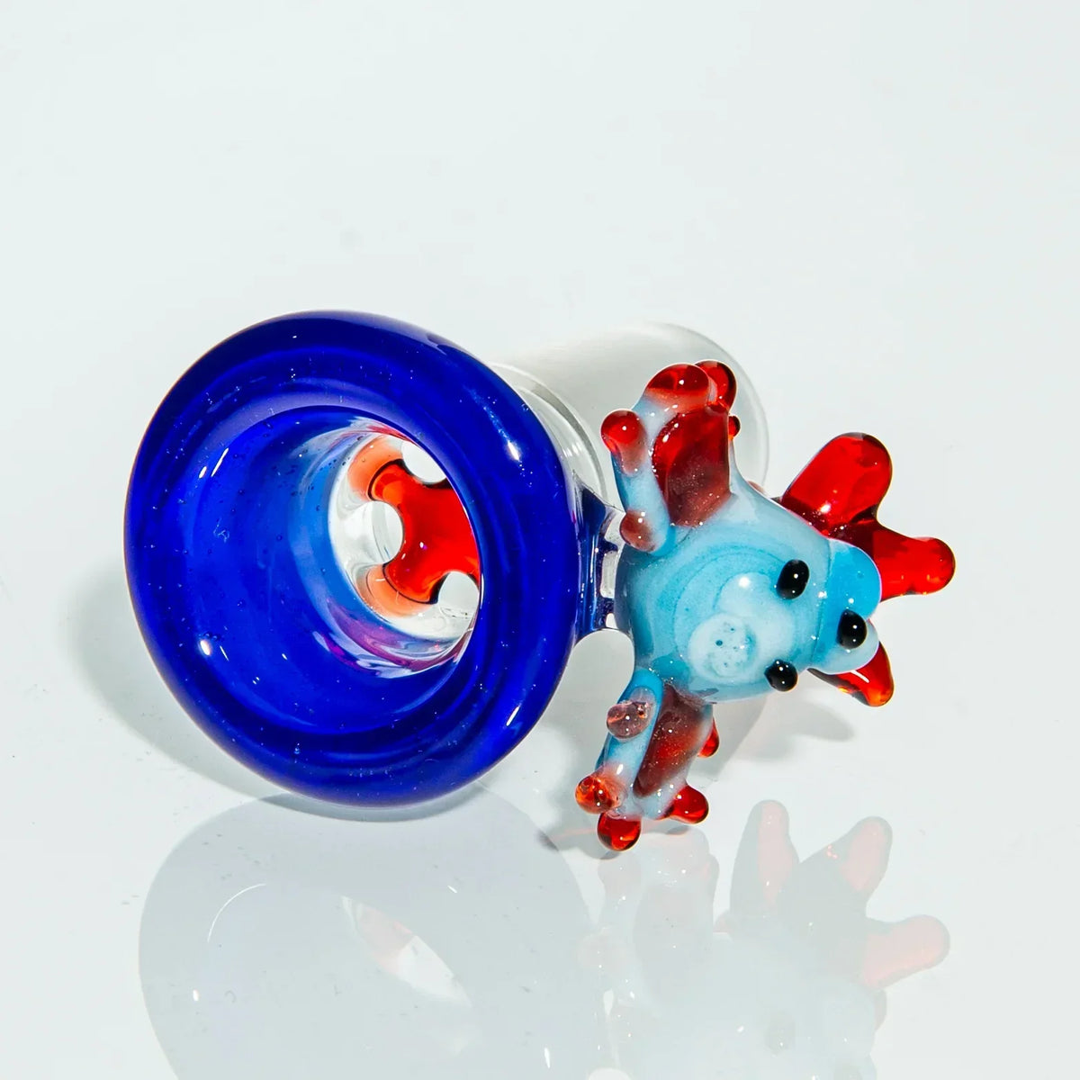 Colorful glass bowl piece with blue rim and red-accented animal design for water pipe