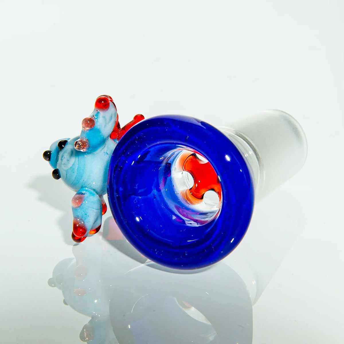 Hand-blown glass bowl slide with blue rim and colorful animal accent for water pipe