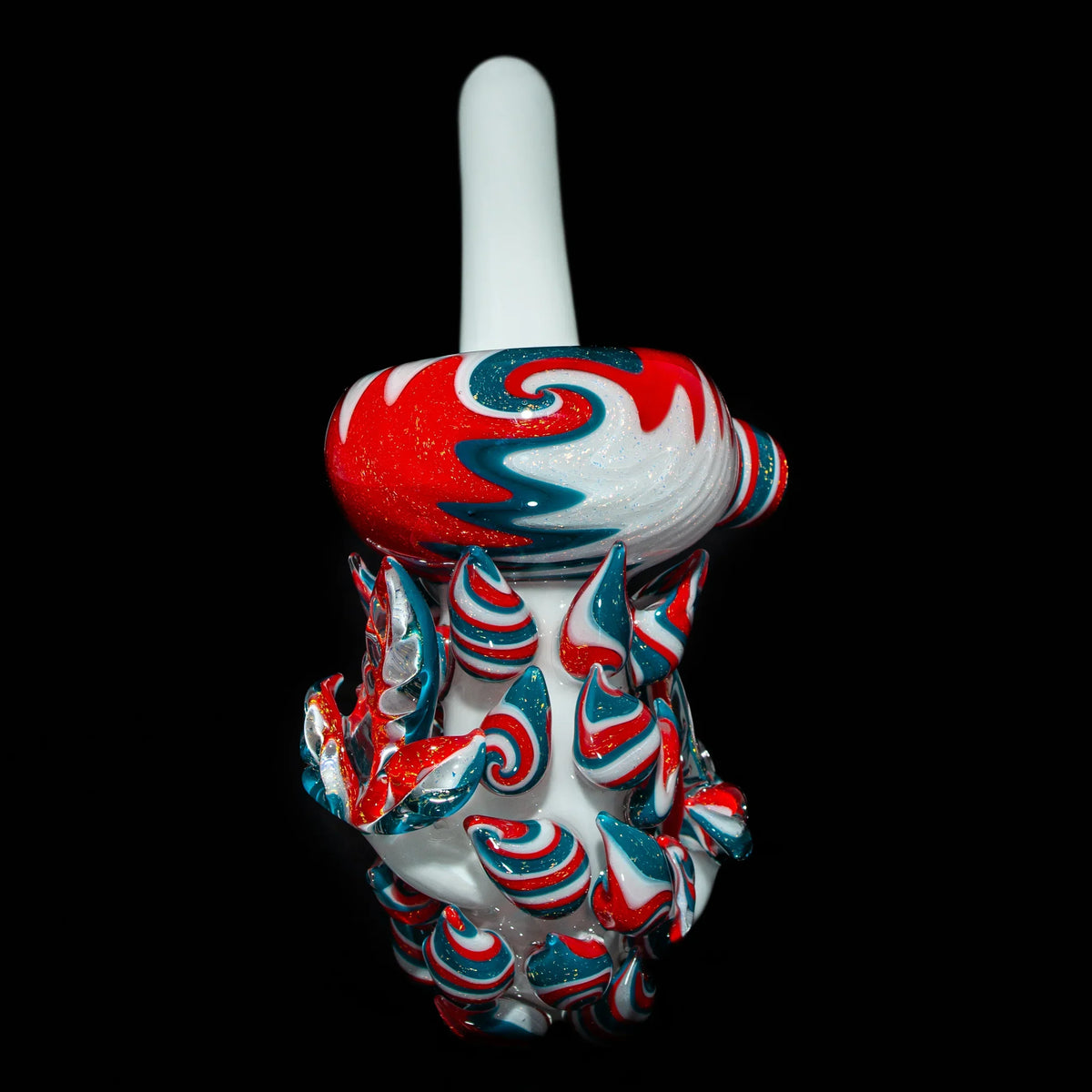 Heady glass pipe with red, white, and blue swirled patterns and raised decorative spikes