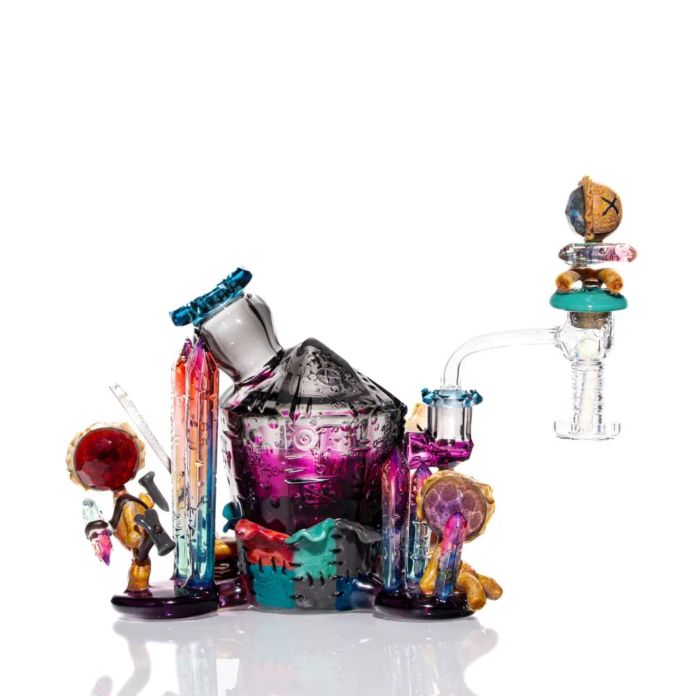 Colorful heady glass dab rig with intricate cosmic and crystal-themed sculptures