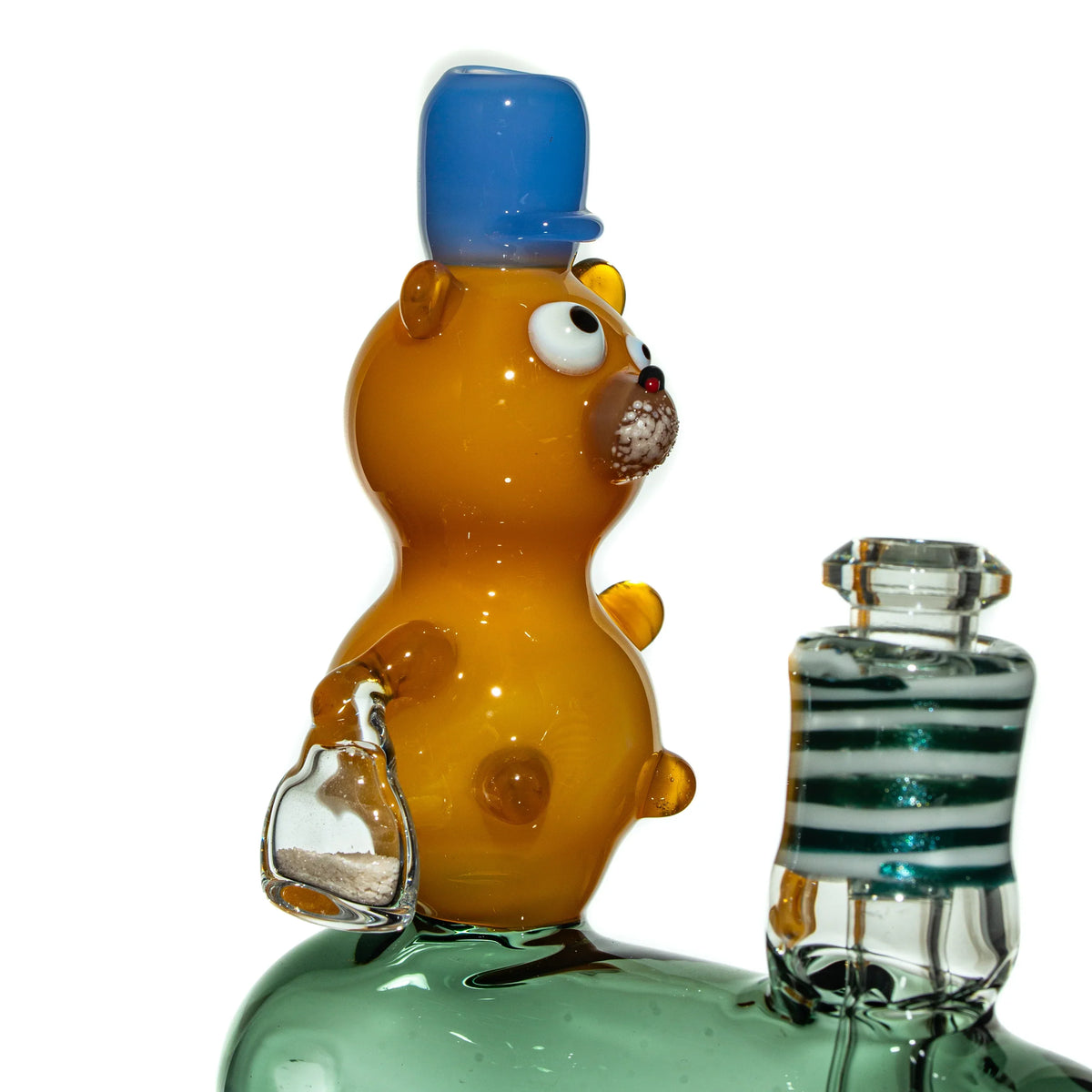 Heady glass bong with cartoon bear figure and blue hat accent detail