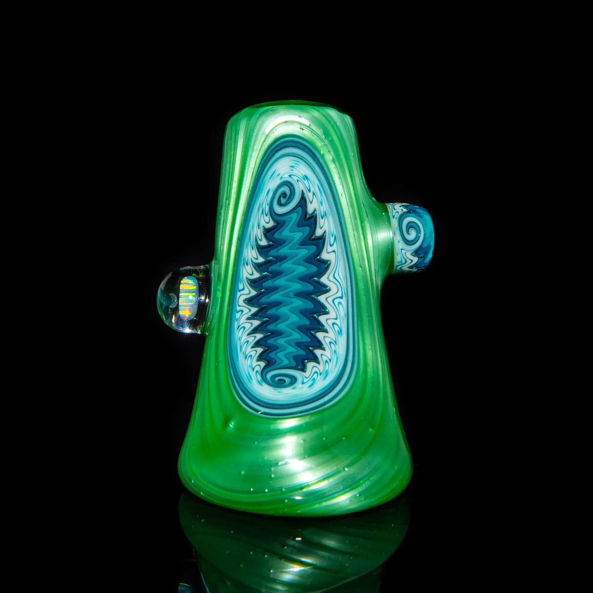 Green and blue heady glass hammer with intricate linework pattern on black background.
