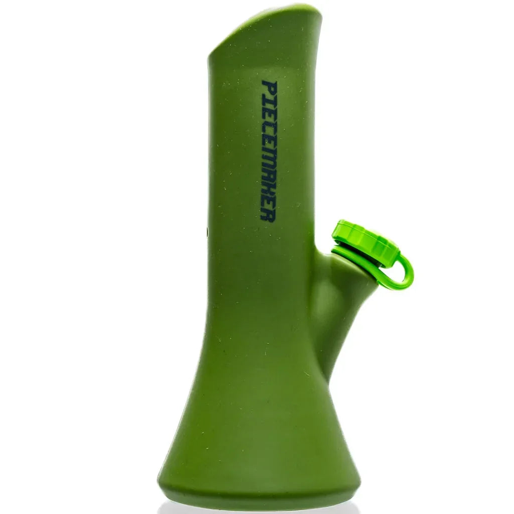 Green silicone water pipe with angled mouthpiece and side cap, PieceMaker logo visible