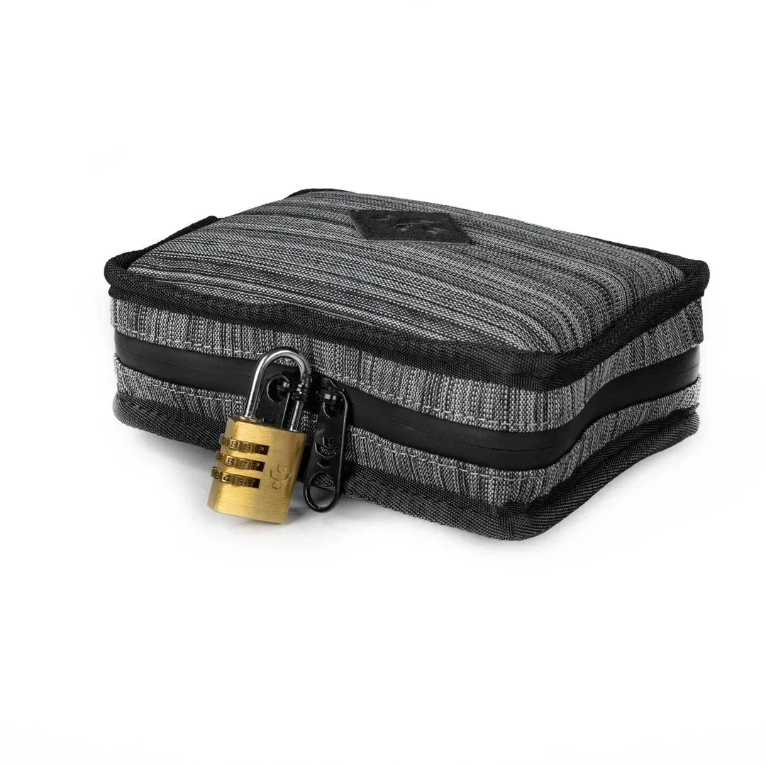 Striped dark gray smell-proof storage case with black zipper and brass combination lock