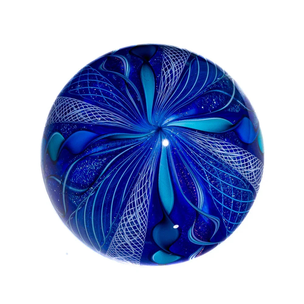 Blue glass marble with intricate white and aqua swirl patterns, heady art glass piece