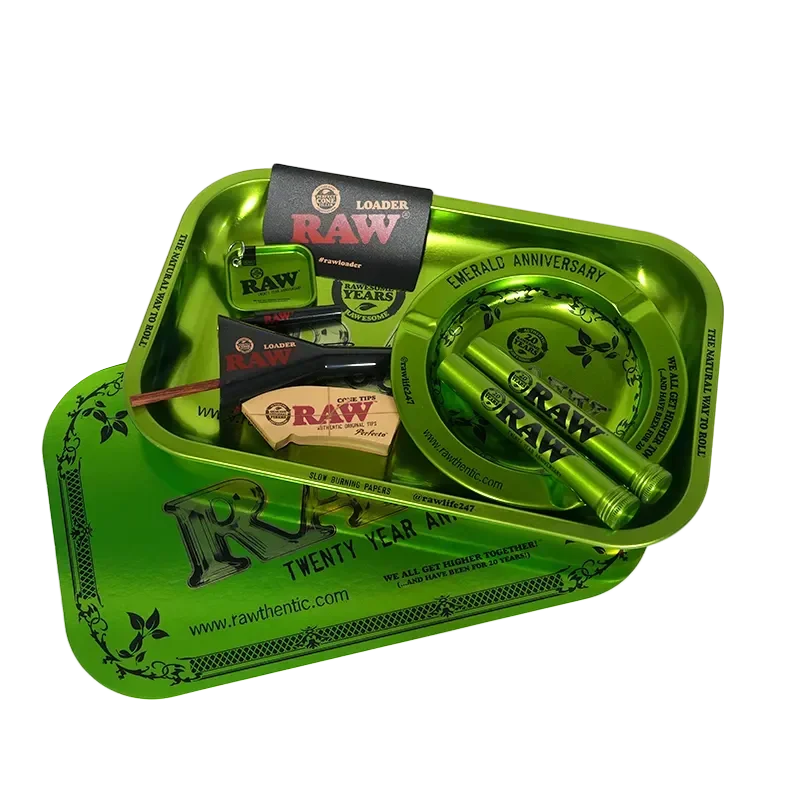 RAW 20th anniversary emerald green rolling tray set with rolling papers, tips, loader, and ashtray.