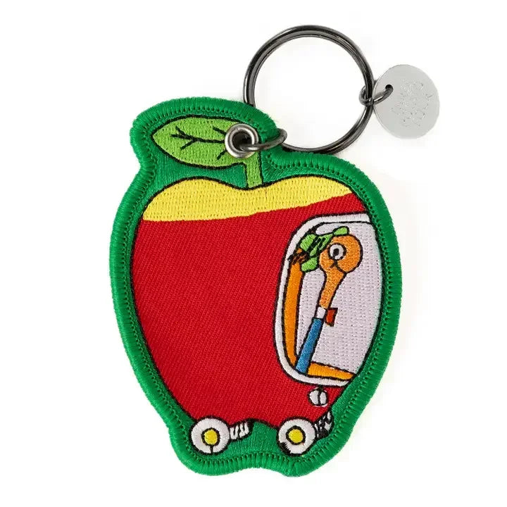 Embroidered apple car patch keychain featuring a cartoon animal driver, whimsical design accessory