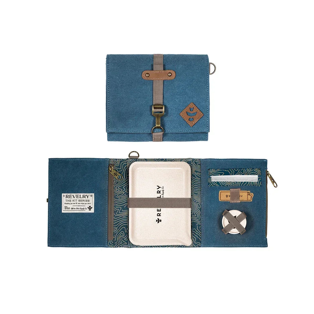 Blue canvas portable rolling kit with compartments, zipper pocket, and accessories organizer