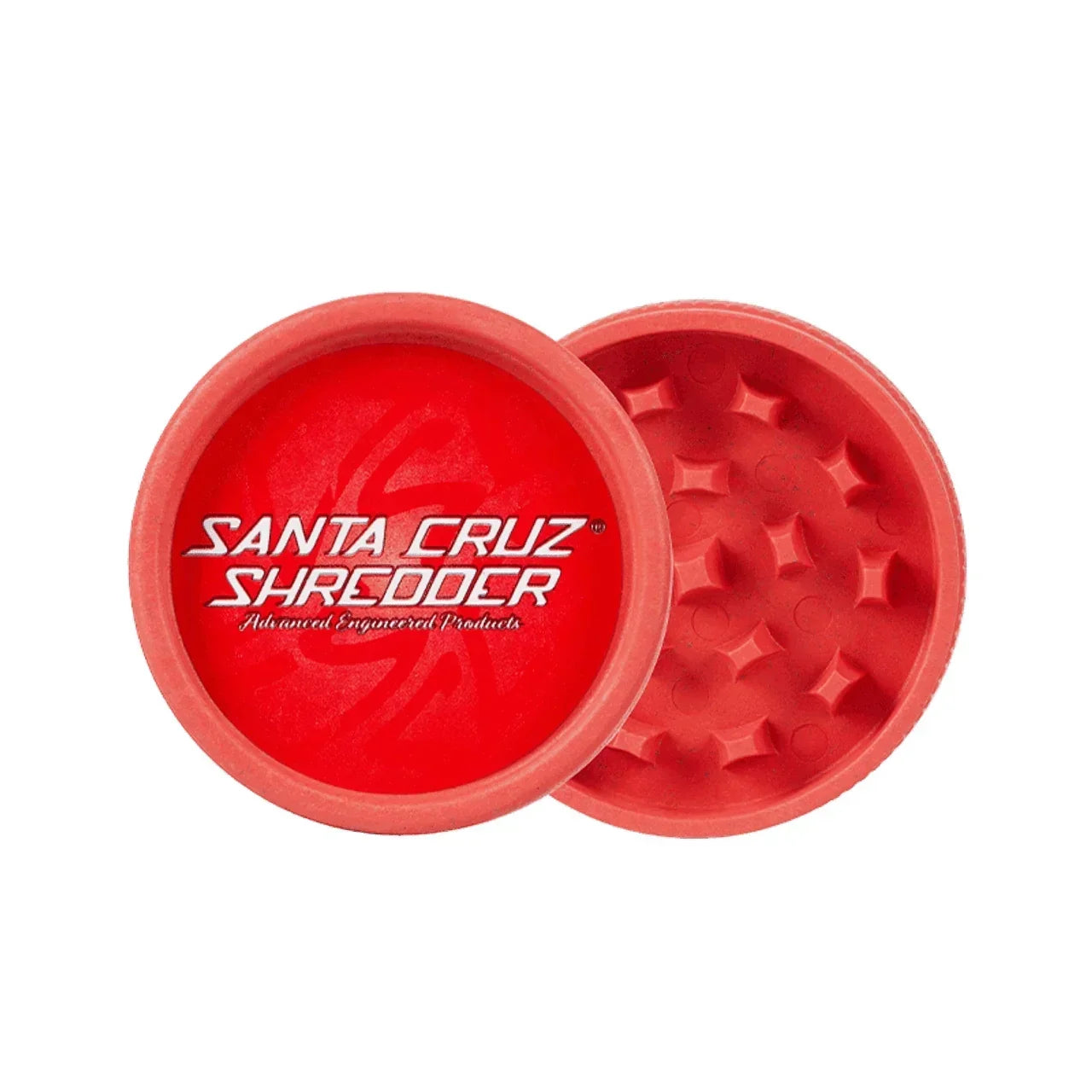 Red Santa Cruz Shredder herb grinder with open lid showing grinding teeth
