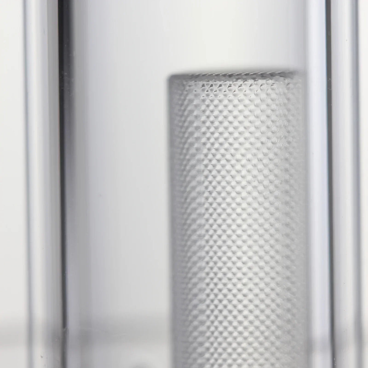 Close-up of textured glass percolator pillar in a water pipe