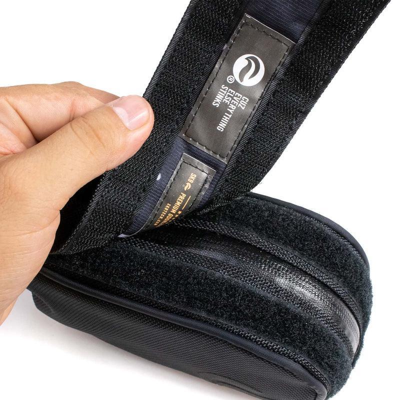 Hand opening black travel pouch with strong velcro closure and smell-proof lining