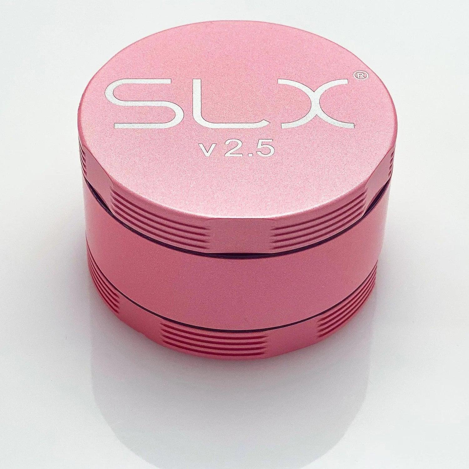 Pink SLX v2.5 herb grinder with textured edges on a white background