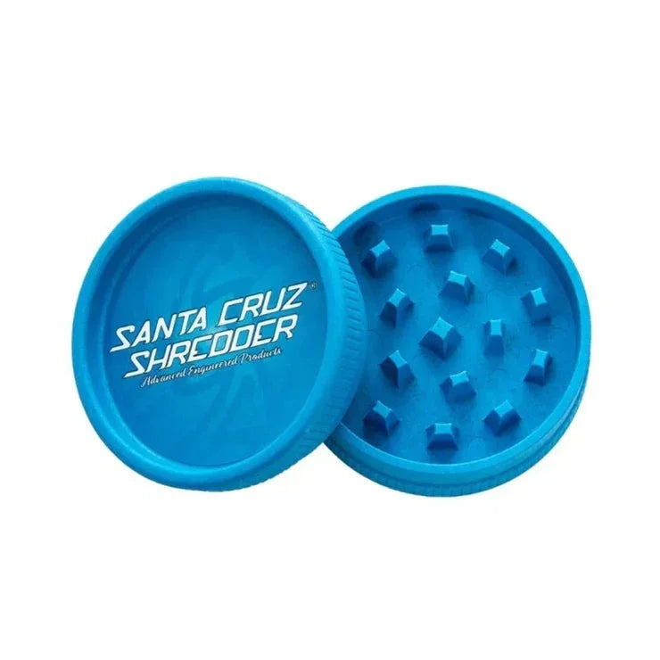 Blue two-piece hemp grinder with textured teeth, Santa Cruz Shredder logo visible.