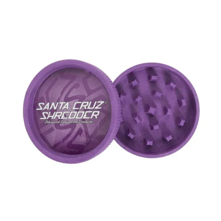 Purple two-piece hemp grinder with textured teeth and Santa Cruz Shredder logo on lid