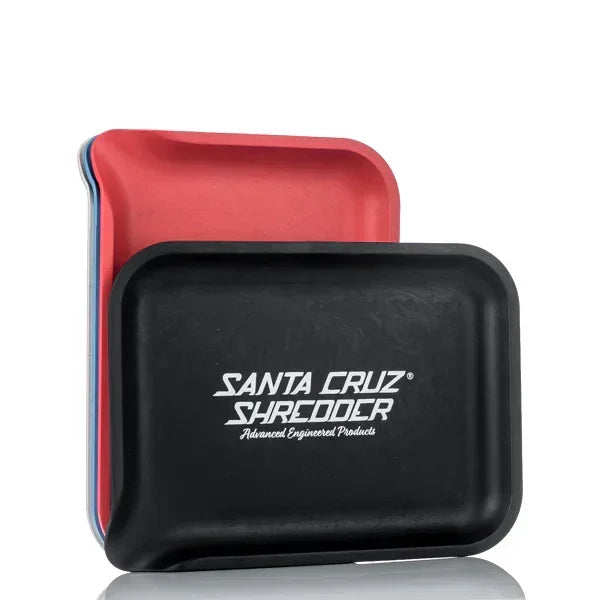 Stacked rectangular hemp rolling trays in black, red, and blue, Santa Cruz Shredder logo visible.