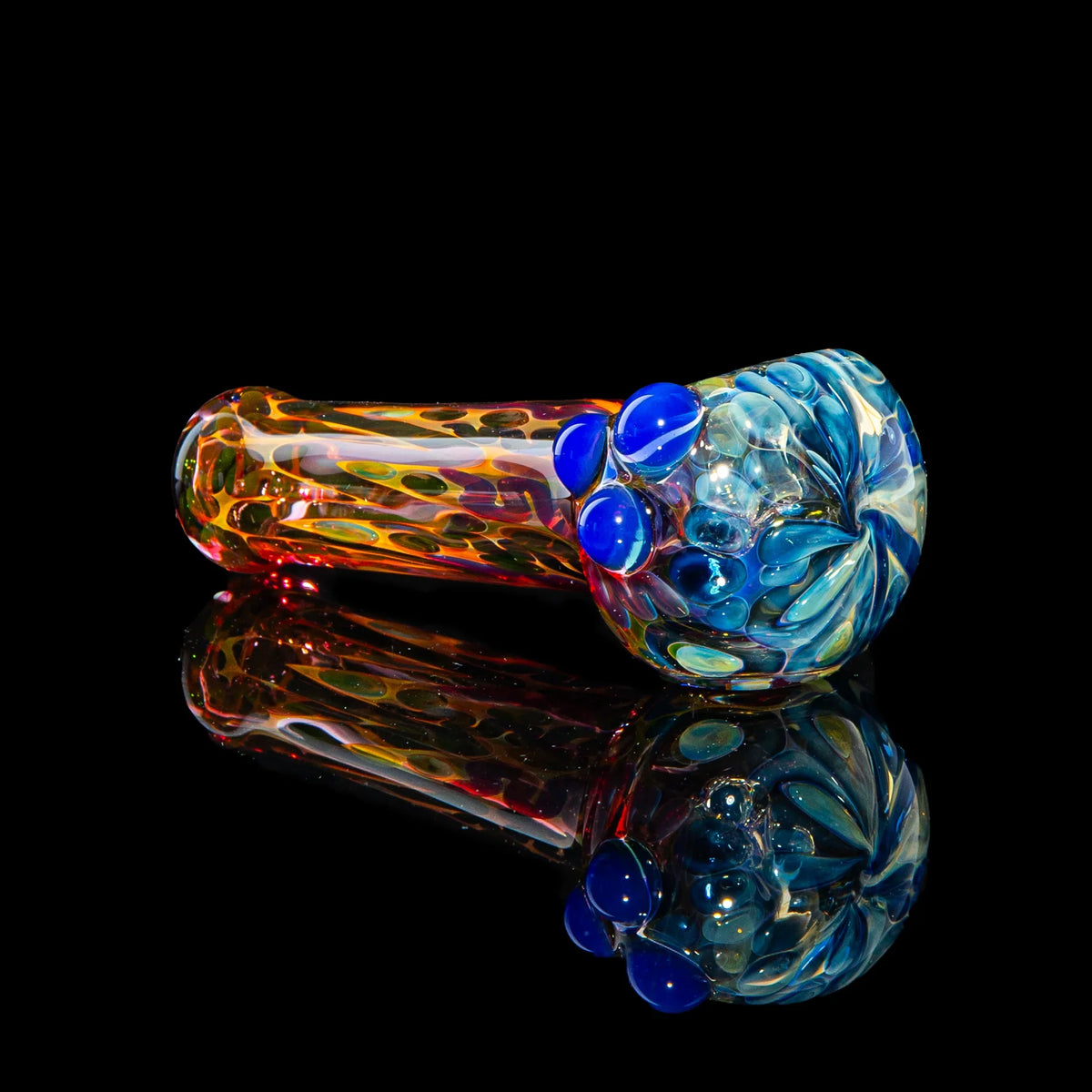 Hand-blown glass Blue Dotted Fumed Four Hole Spoon by Sarah Marblesbee