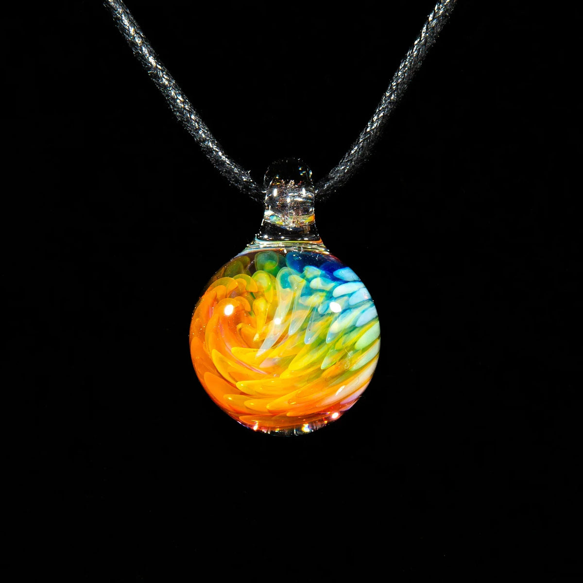 Colorful glass marble pendant with swirling rainbow pattern on black cord