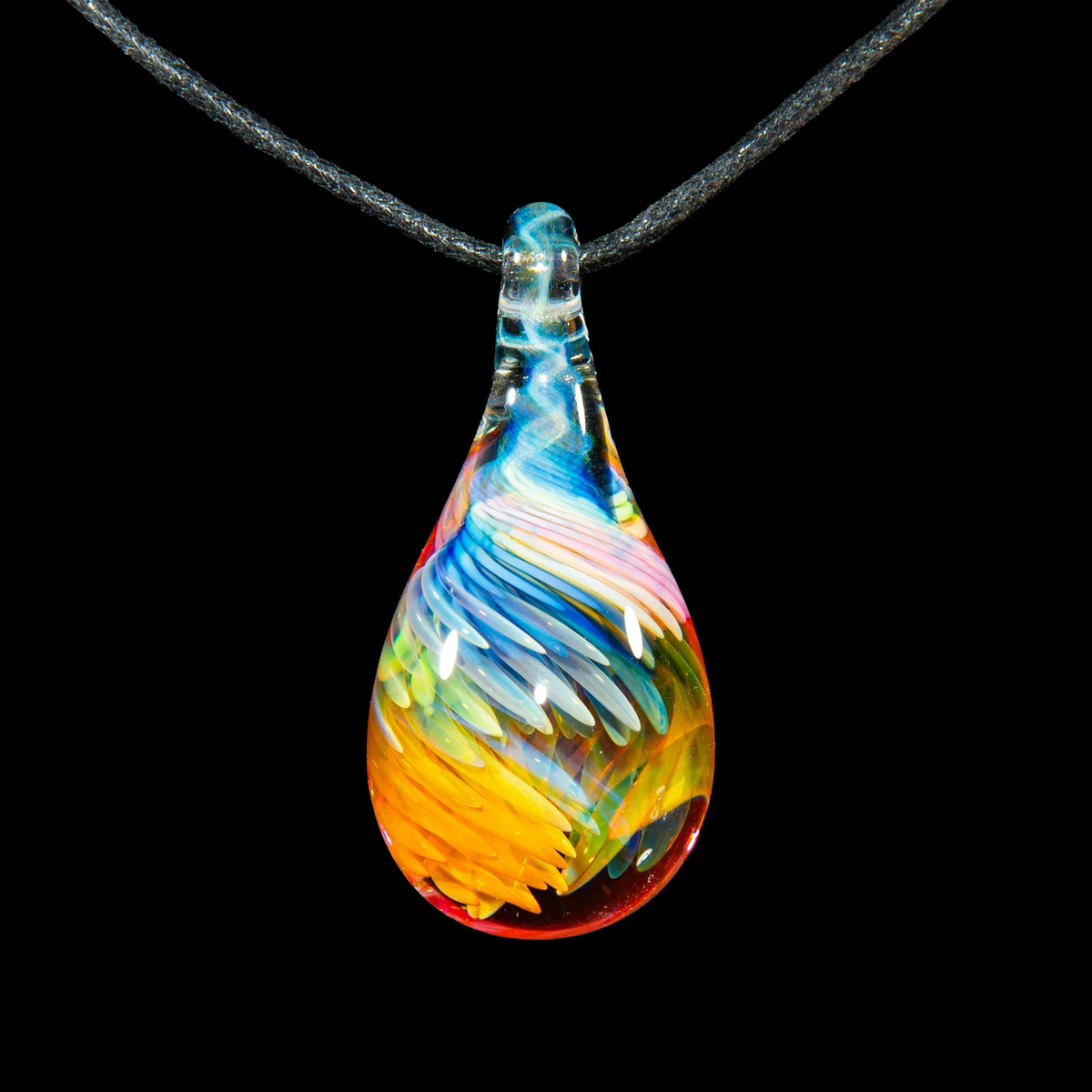 Colorful teardrop glass pendant with swirling blue, yellow, orange, and white patterns