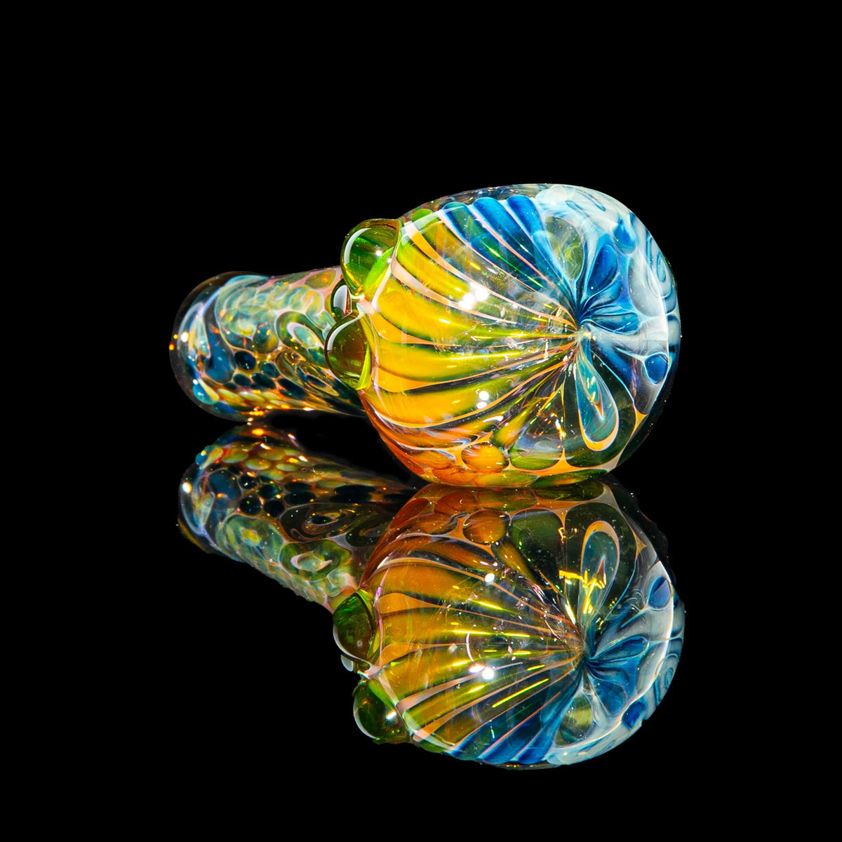 Hand-blown glass Green Dotted Fumed Four Hole Spoon by Sarah Marblesbee