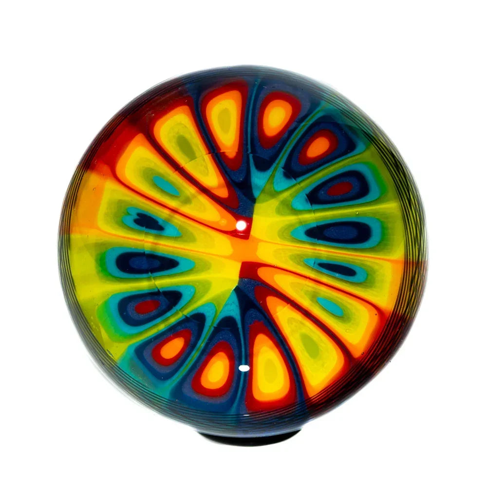 Handblown glass marble with vibrant rainbow pattern and black retti design, 42mm size.