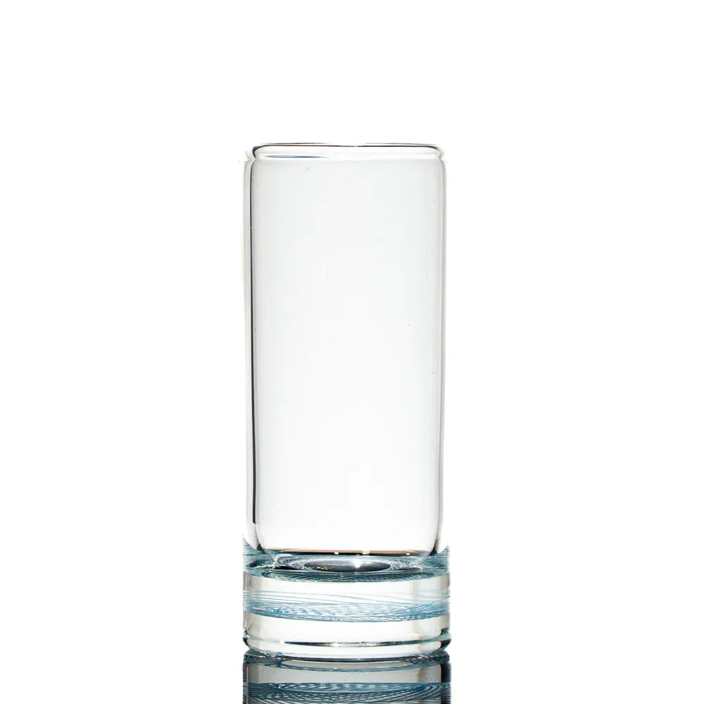 Clear retti portal shot glass with round base on a white background
