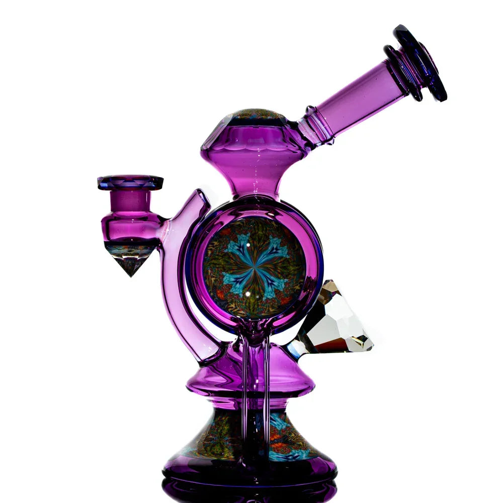 Purple heady glass water pipe with intricate mandala design and crystal accent
