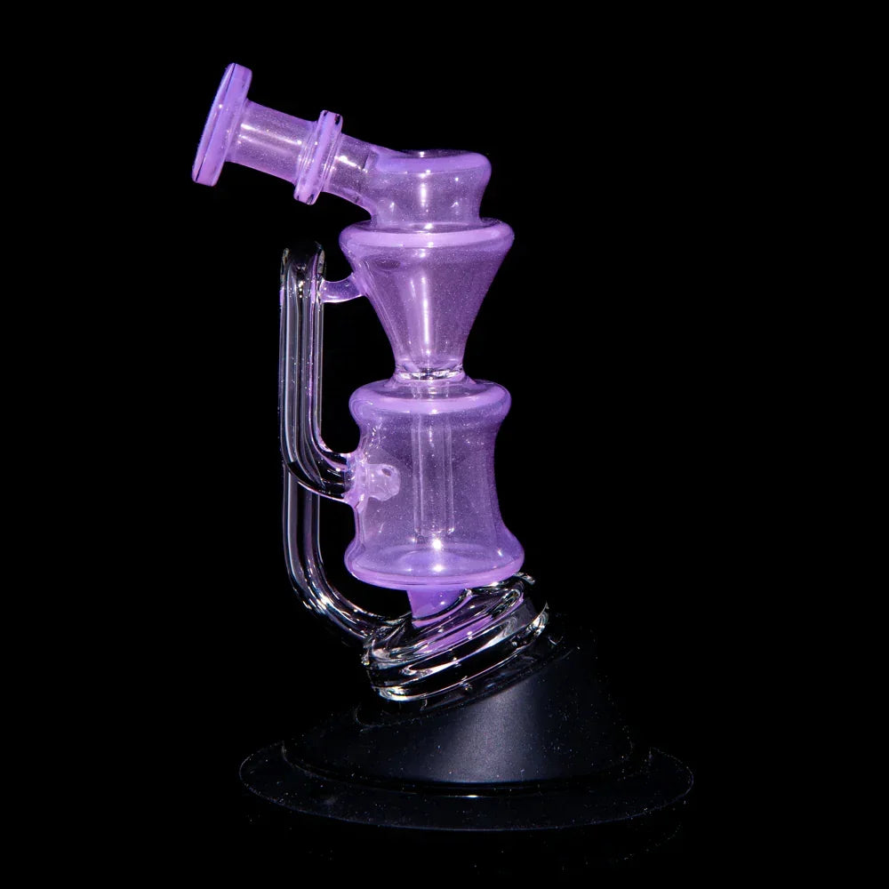 Purple glass recycler bong with unique curved design on black background