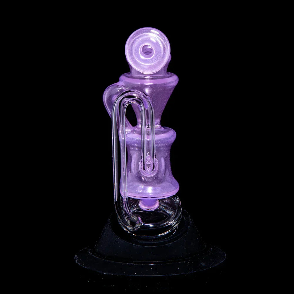 Purple glass recycler water pipe with unique curved design on black background