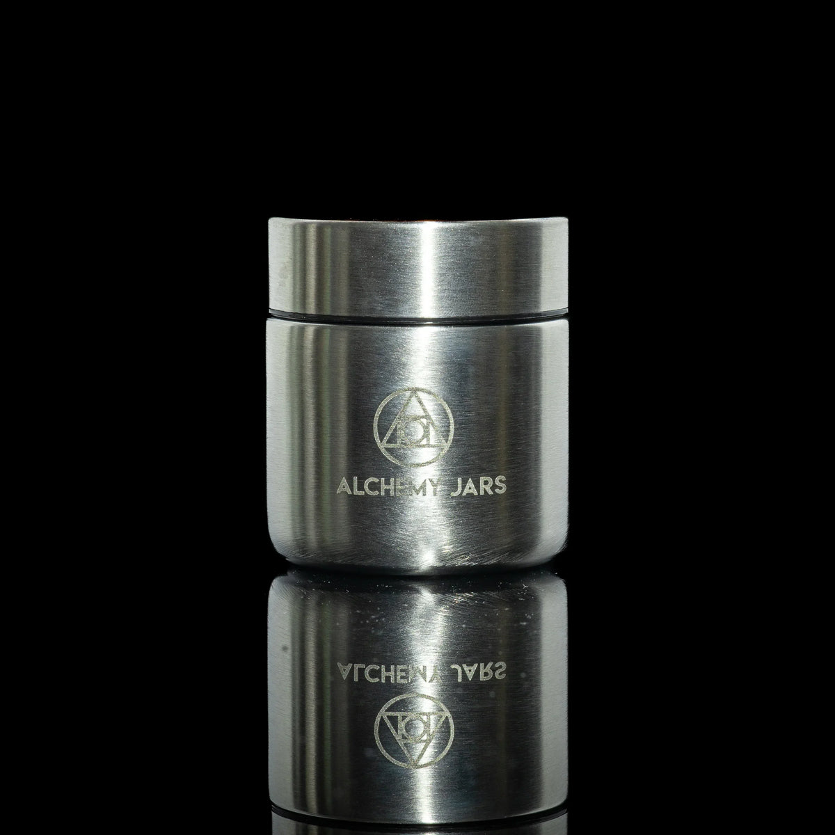 Stainless steel Alchemy Jars storage container with airtight lid on black background