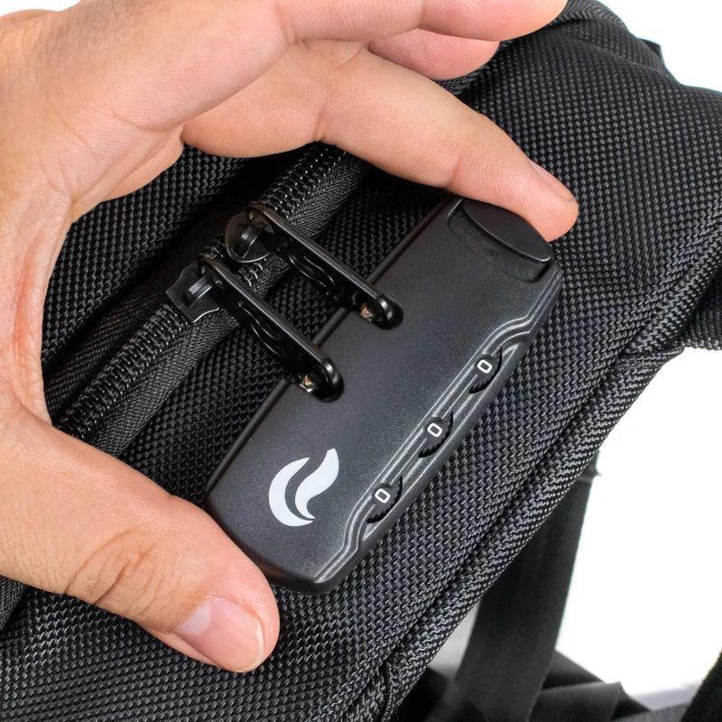Close-up of a combination lock on a black smell-proof backpack pocket