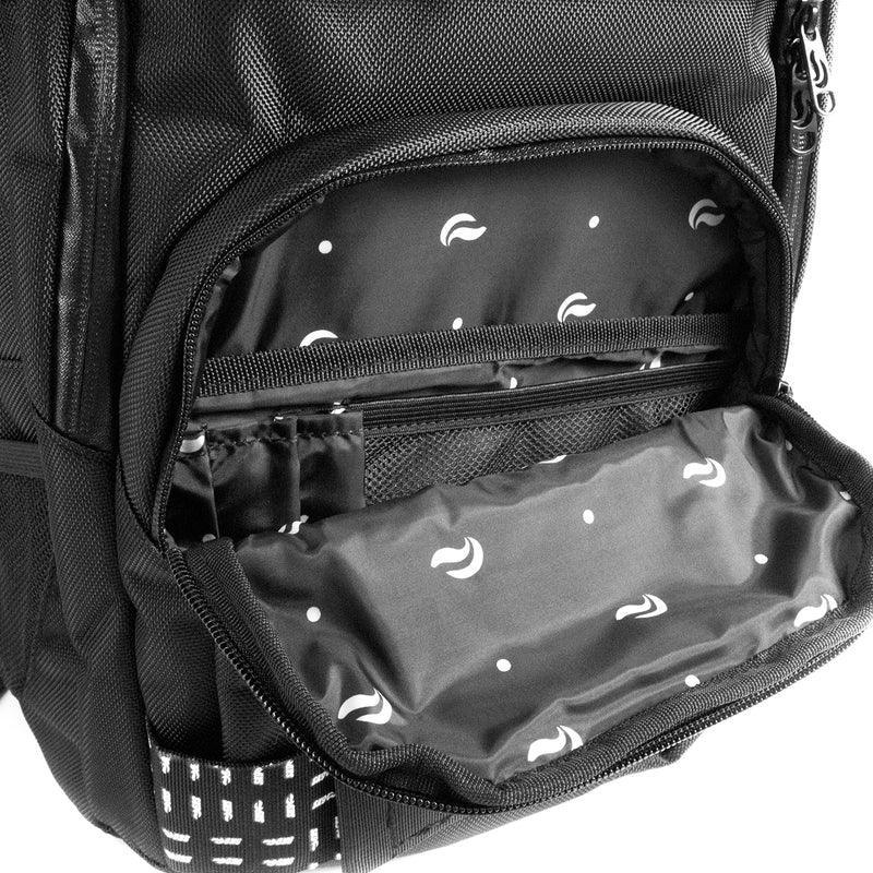 Close-up of black backpack open front pocket with patterned lining and multiple compartments