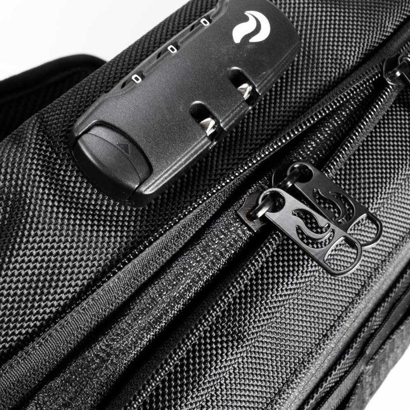 Close-up of black carbon fiber sling bag with combination lock and flame-design zipper pulls