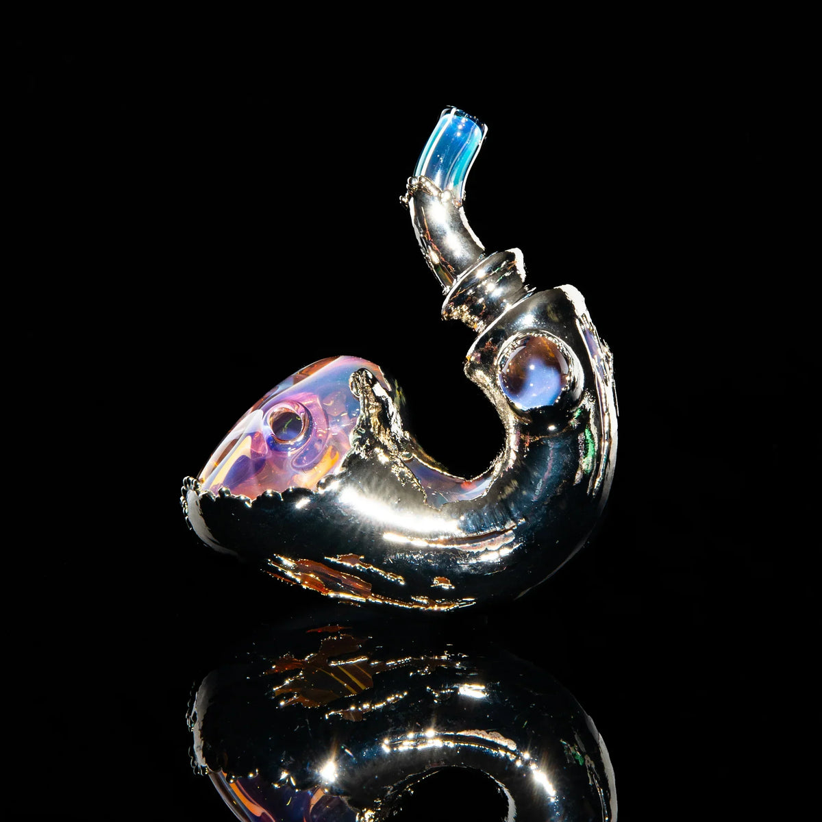 Nickel sherlock glass pipe with metallic and iridescent details on black background
