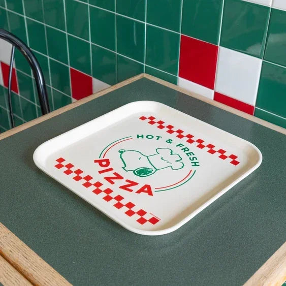 Square pizza tray with cartoon chef dog and 'Hot & Fresh Pizza' text on diner table