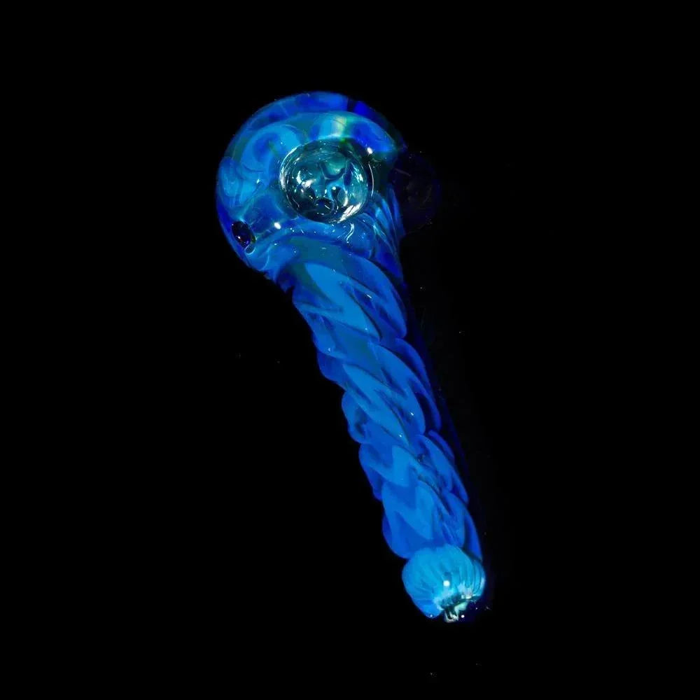 Blue inside-out glass spoon pipe with twisted design on black background