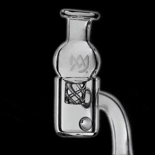 Clear glass quartz banger with spinner insert for dab rigs on black background