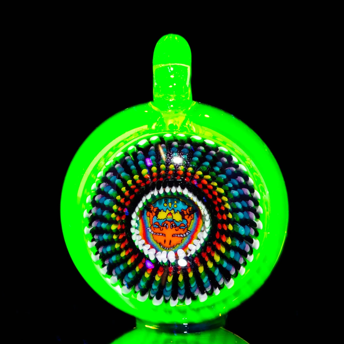 Neon green heady glass pendant with psychedelic rainbow pattern and detailed center design