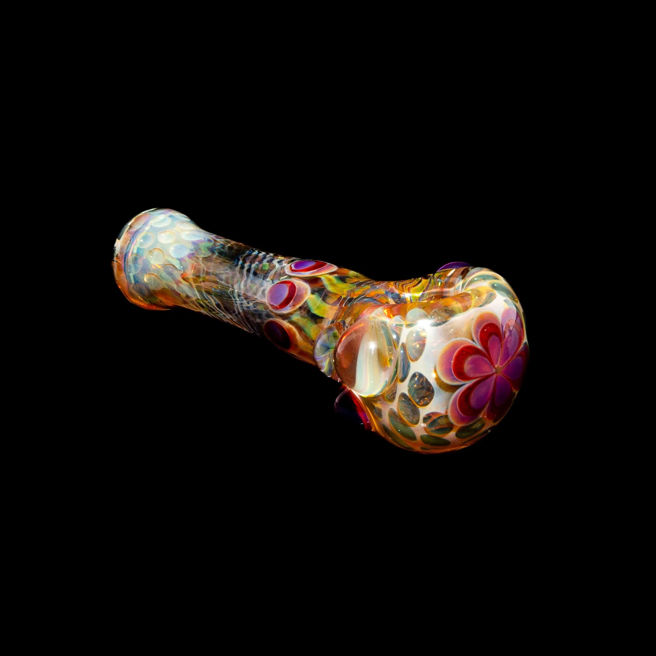 Hand-blown glass spoon pipe with honeycomb cap and amber purple dot accents