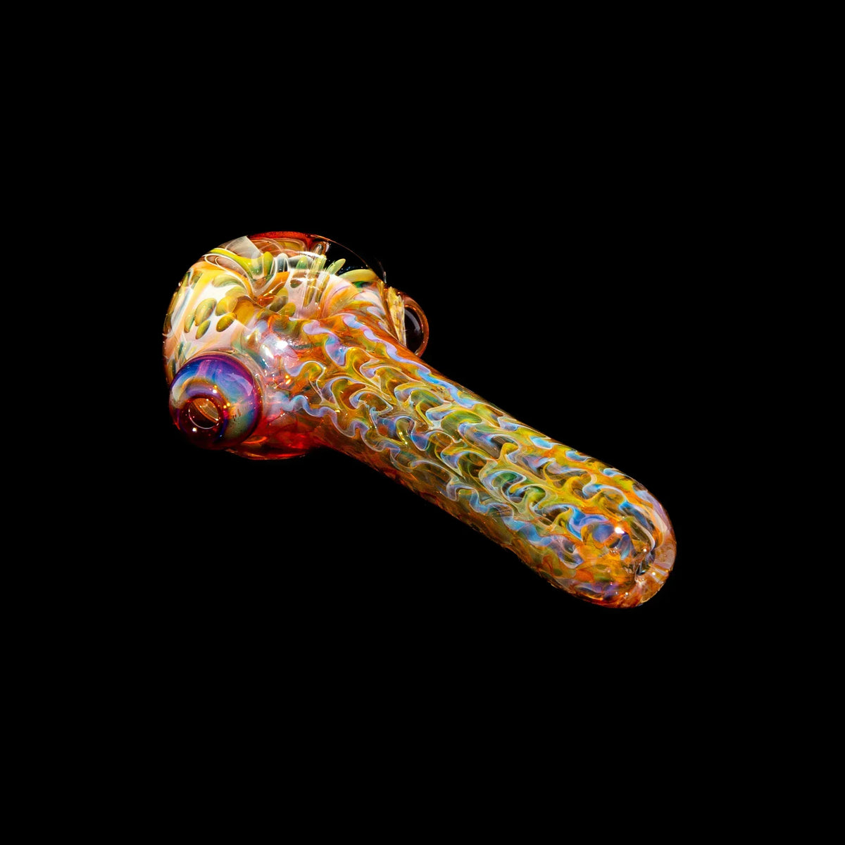 Heady glass hand pipe with fume wrap and honeycomb millie design on black background