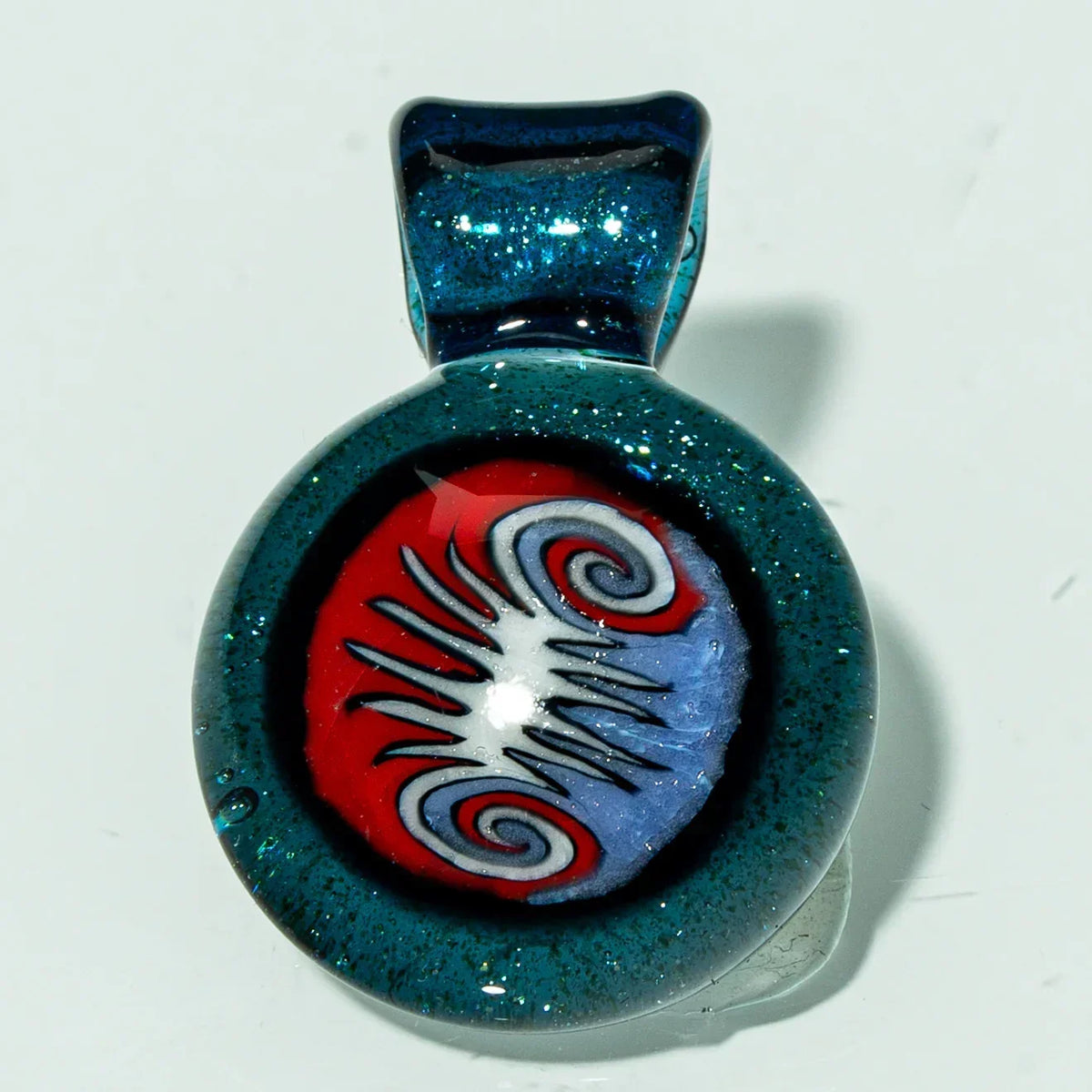 Handcrafted glass pendant with blue glitter edge and abstract red, white, and blue swirl design