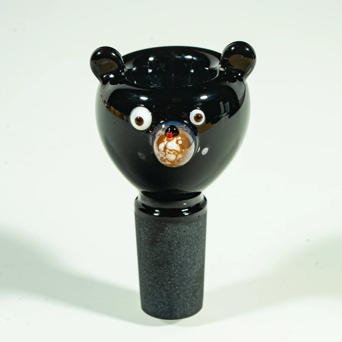 Handcrafted glass bowl slide shaped like a black bear head, 14mm male joint accessory.