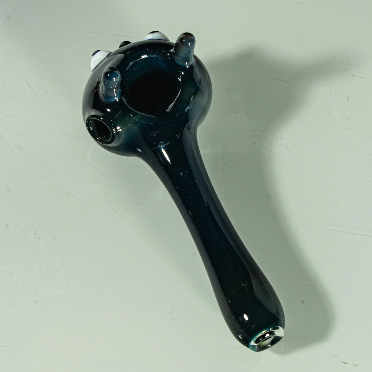 Black glass hand pipe with Totoro-inspired design and character details