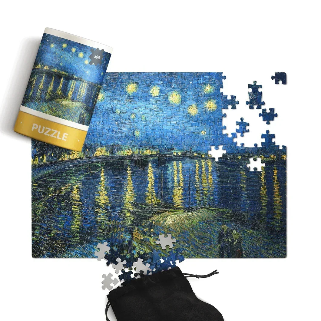 300 piece jigsaw puzzle featuring a starry night painting, partially completed with loose pieces.