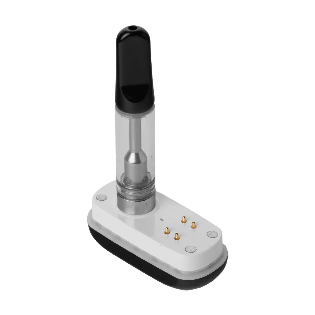 Vaporizer cartridge with mouthpiece on magnetic white connection base, isolated on white