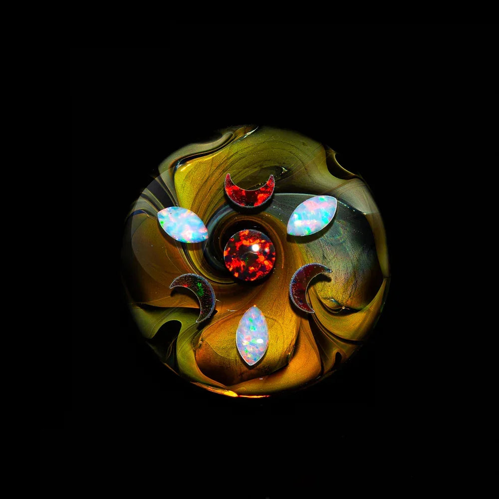 Heady glass art pendant with opal inlays and swirling multicolor designs on black background