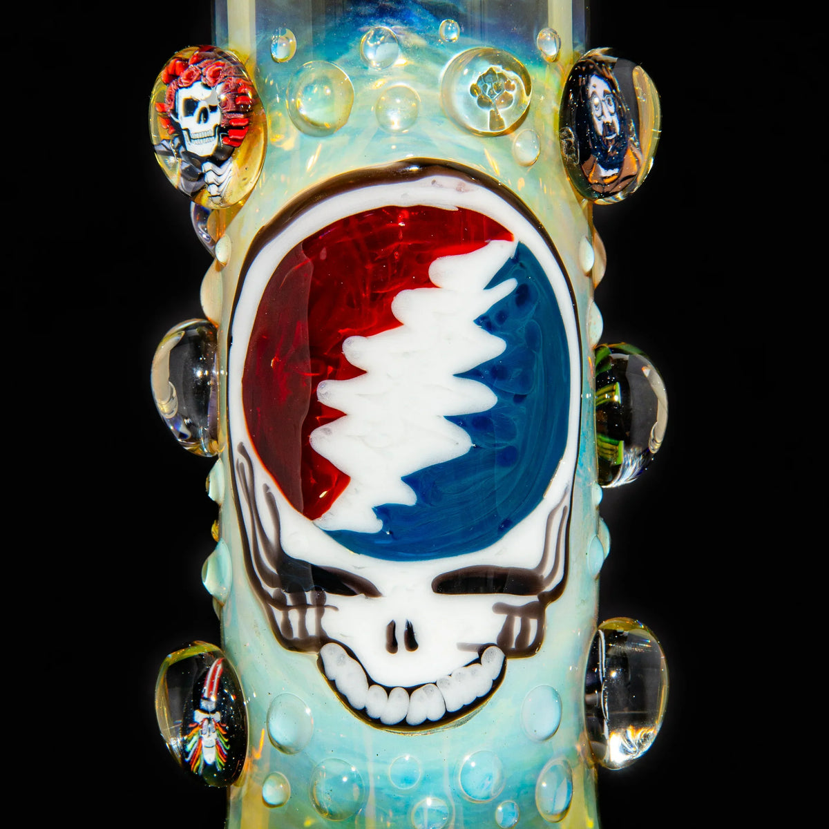 Detailed glass bong featuring a colorful skull and lightning bolt design with clear glass accents.