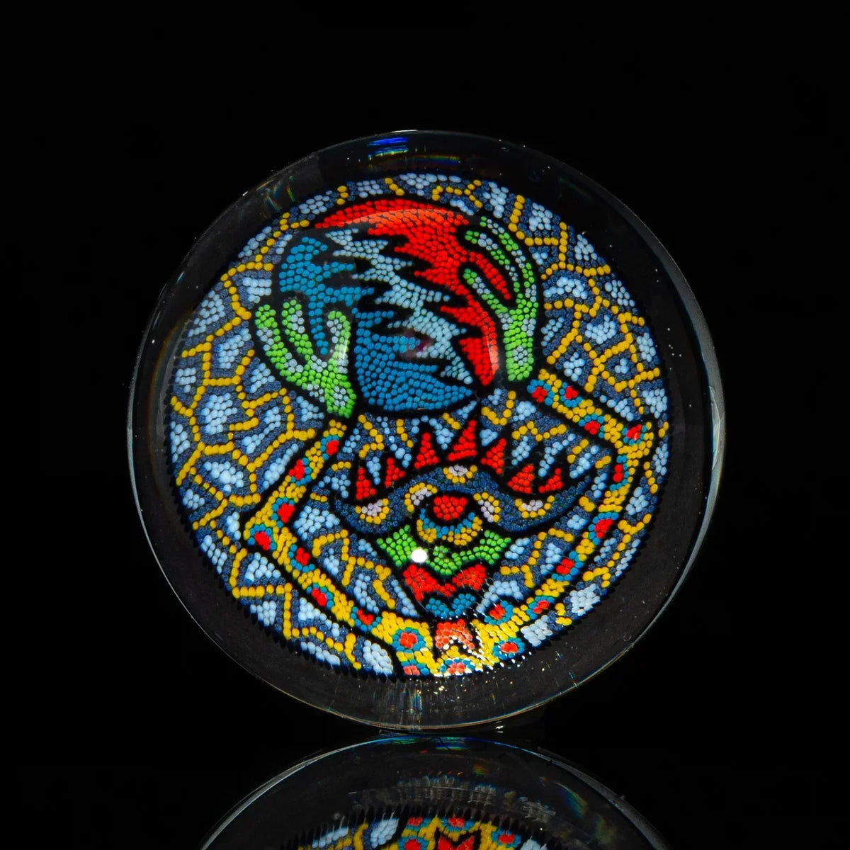Intricate glass art marble with vibrant psychedelic dotwork and abstract patterns on black background